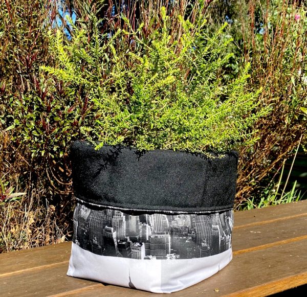 Put a plant in a fabric bowl
