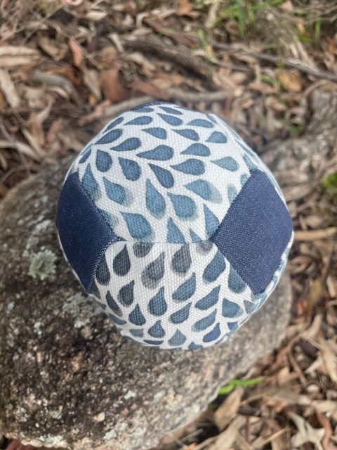 Soft fabric ball with a raindrop pattern